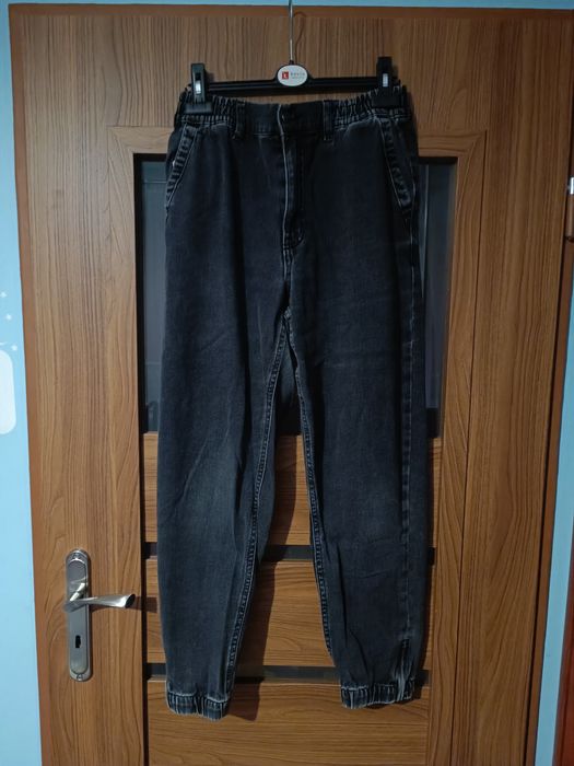 Spodnie damskie jeansowe w rozmiarze 40 marki Sinsay