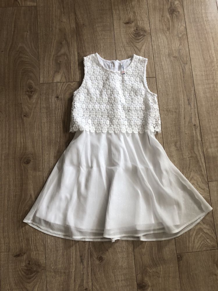 Wlegancka sukienka cocodrillo elegant  roz 140