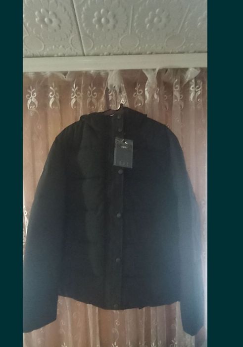 Зимова куртка нова 52 р