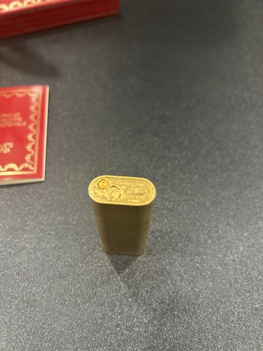 Isqueiro Cartier dourado