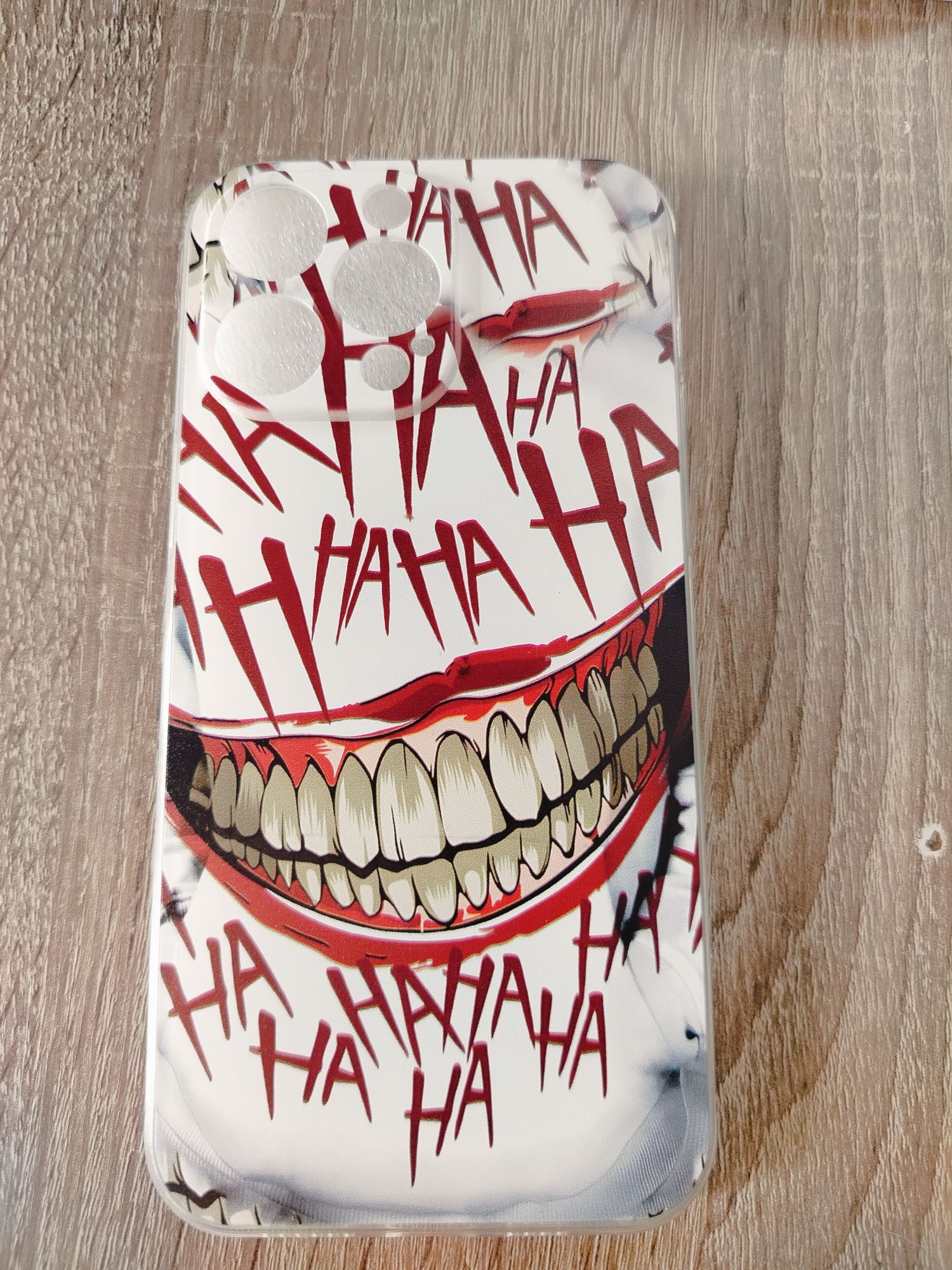 Etui na iPhone z nadrukiem "HAHA" – nowe, oryginalnie zapakowane!
