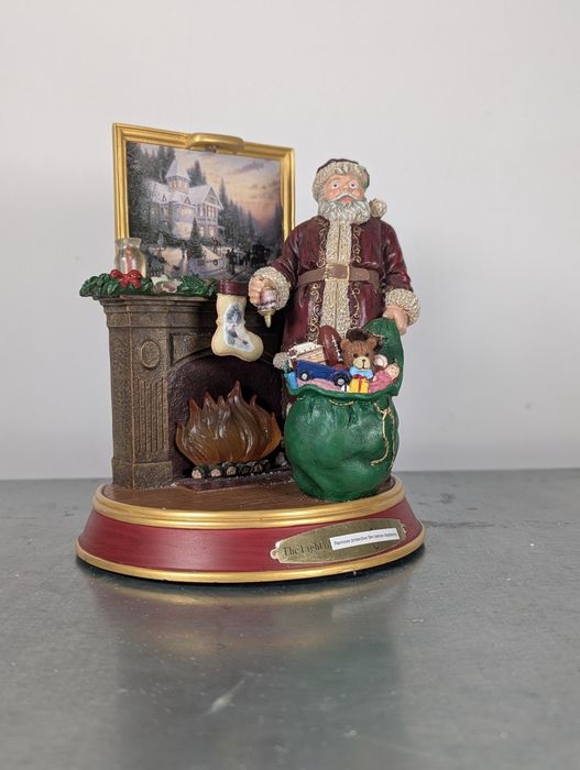 Świąteczna figurka Światło Bożego Narodzenia św Mikołaj Thomas Kinkade