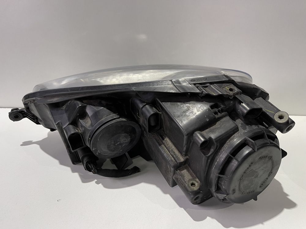Фари оптика фара Гольф 5 03-09 Hella фари передні Golf 5 Jetta