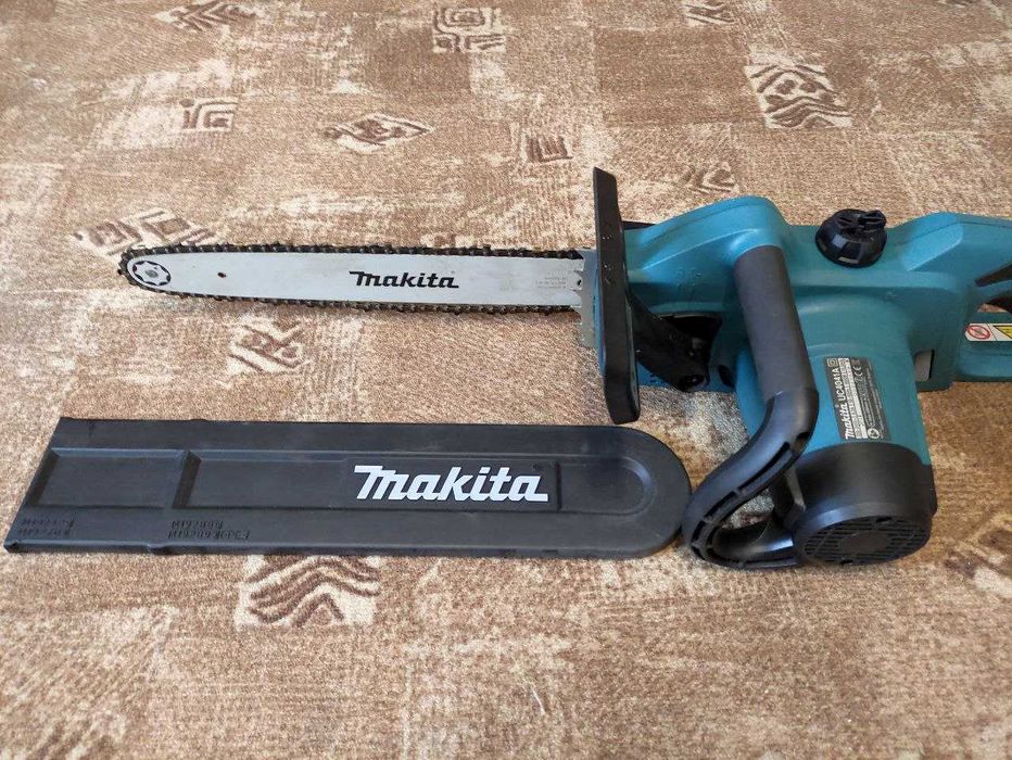 Електропила Makita UC4041A