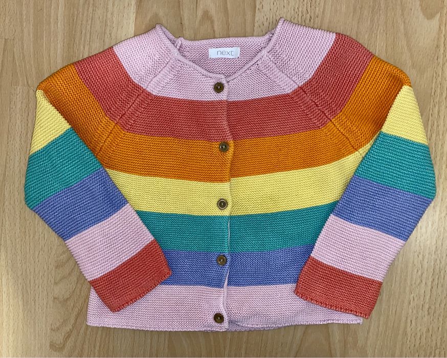Kolorowy sweterek dziewczęcy Next