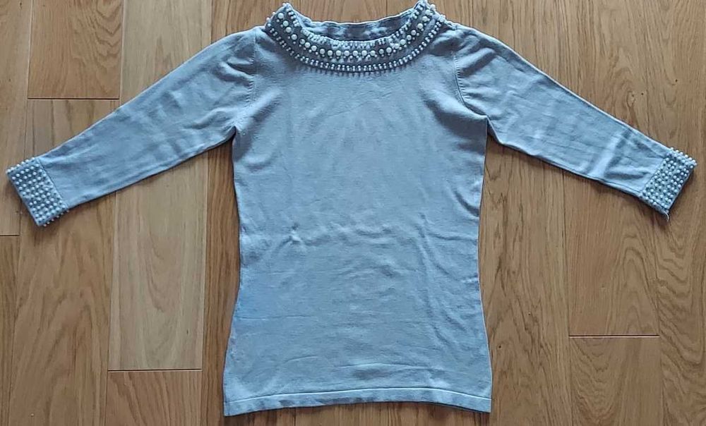 Reserved beżowy sweterek koraliki S cudo