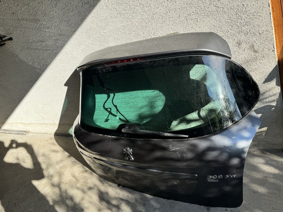 Klapa bagażnika ,szyba peugeot 308