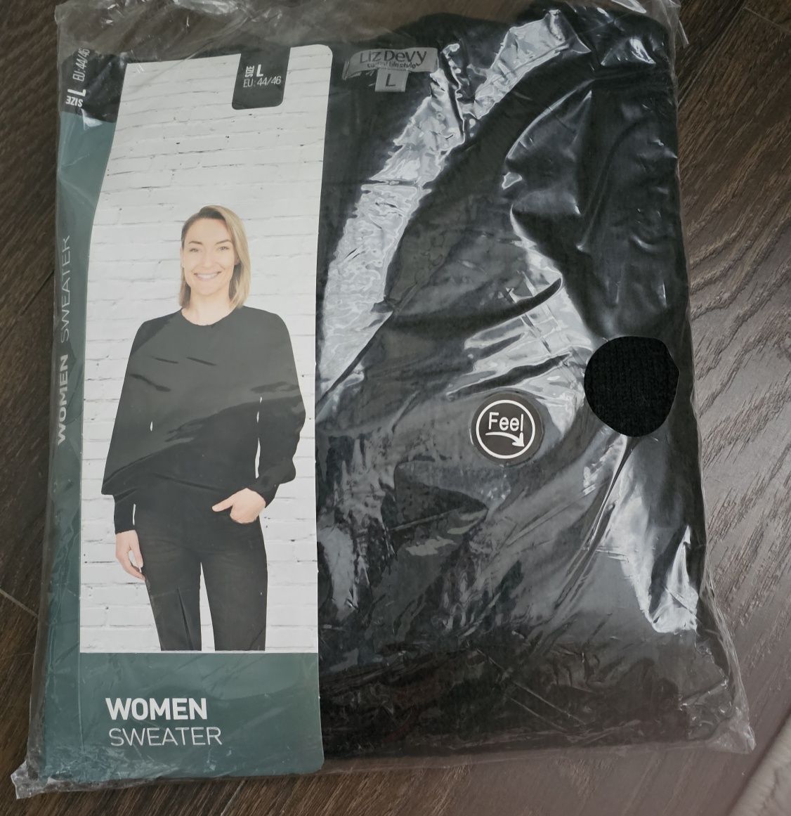 Czarny sweter damski r.L Nowy