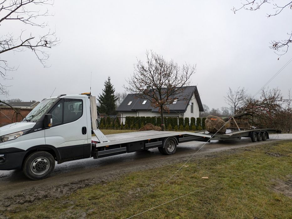 Pomoc drogowa- transport maszyn laweta, holowanie