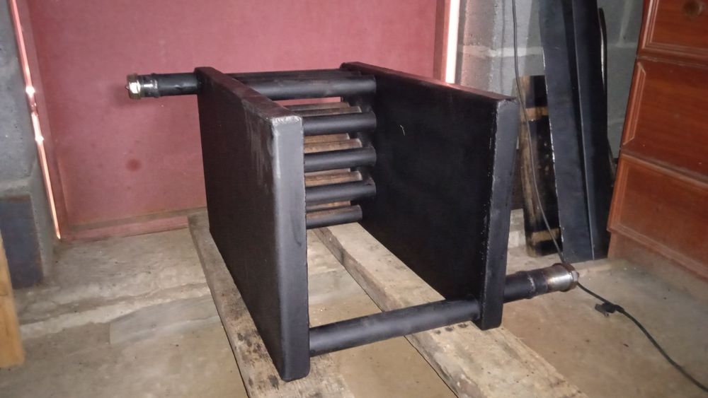 Котел в плиту грубу,сенвіч димоходи,твердопаливні котли.