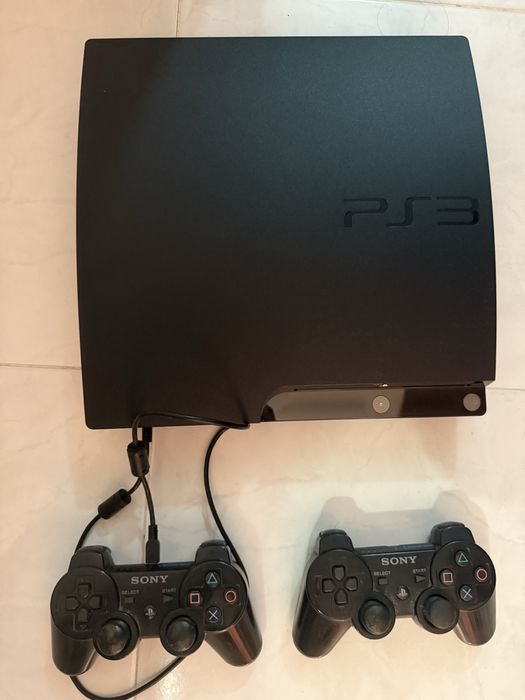 Ps3 com 2 comandos e jogos