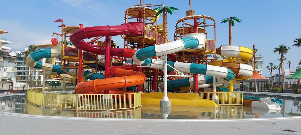 Аренда апартаментов в комплексе с аквапарком 5* в Тюрклер, Алания