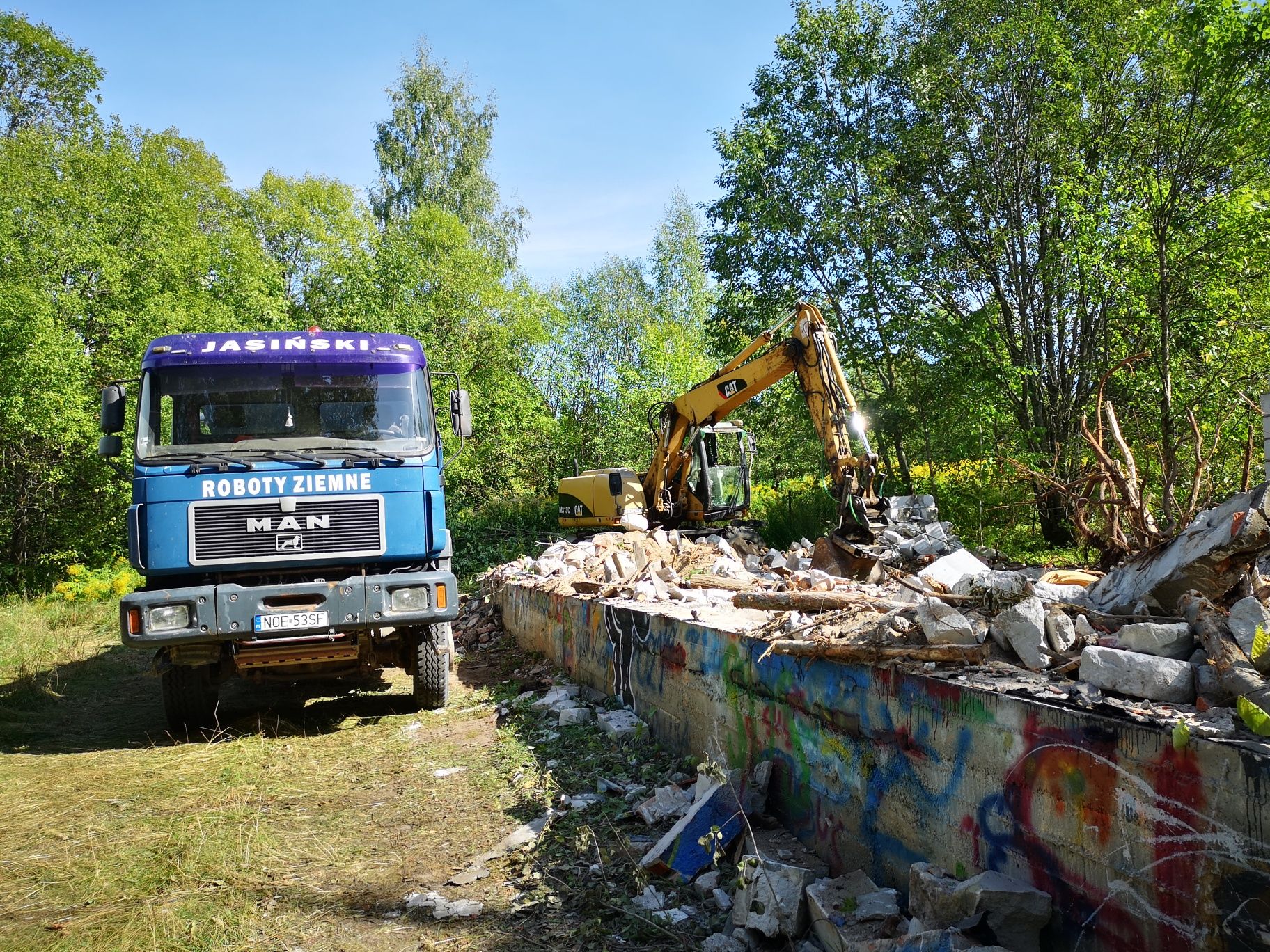 Koparka ,autolaweta ,wywrotka,transport,melioracja,kanalaizacja,staw