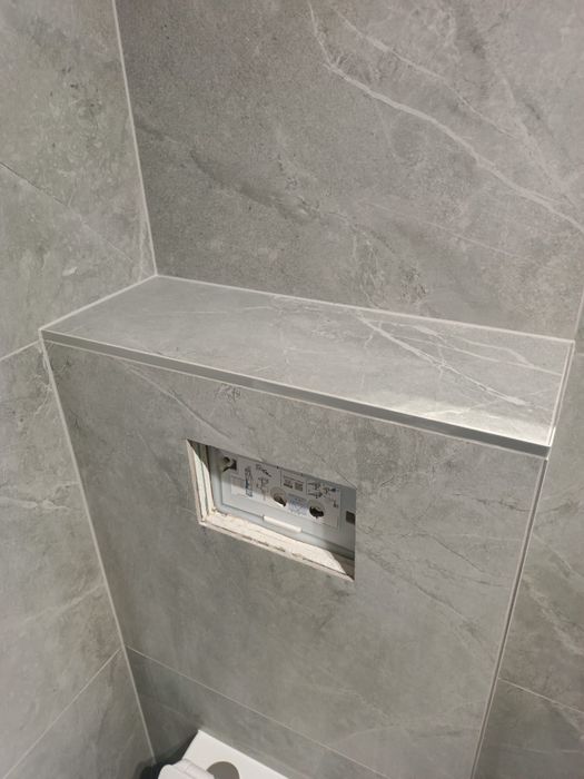 Glazurnik,fliziarz,płytkarz,układanie płytek,łazienki