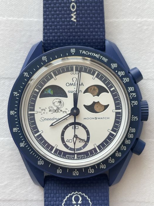 Swatch Omega Mission to Esrthphase Moonshine Gold