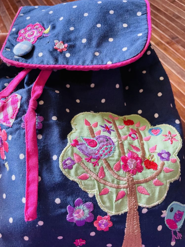 Mochila de tecido com alças ajustáveis! Excelente!!