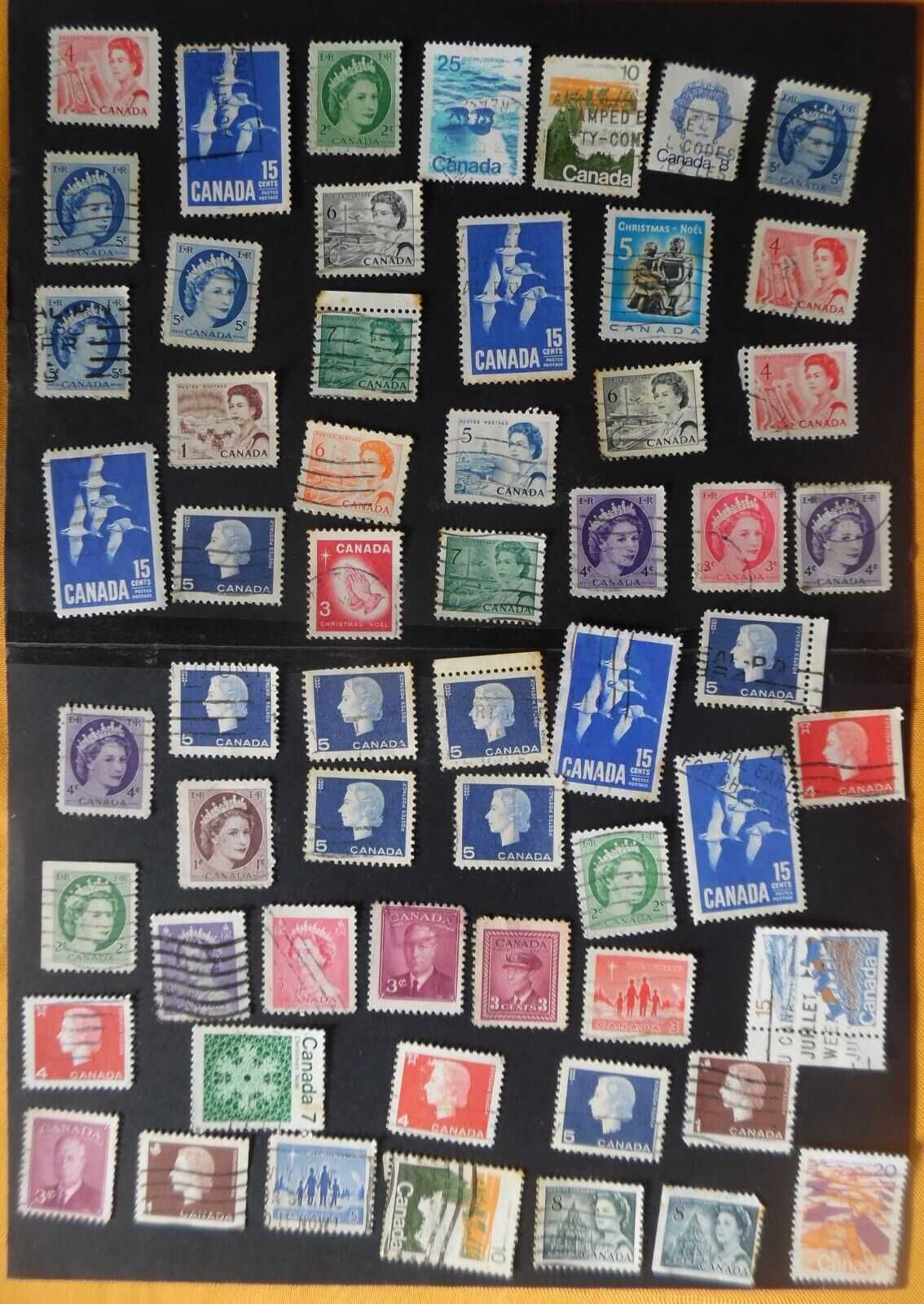 Selos Canadá-Lote selos Clássicos novos/usados (2 páginas de selos)