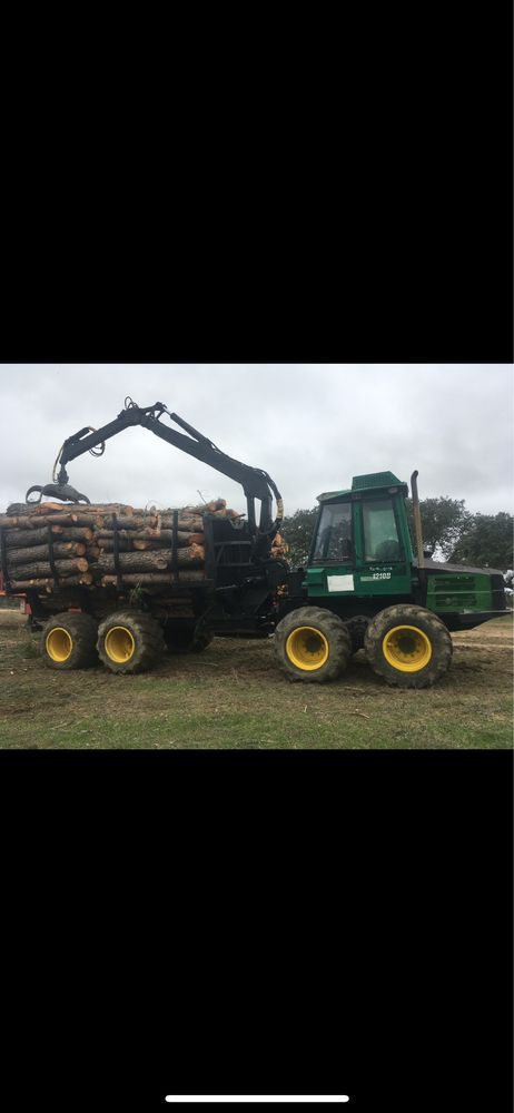 Maquina de rechega timberjack 1210B