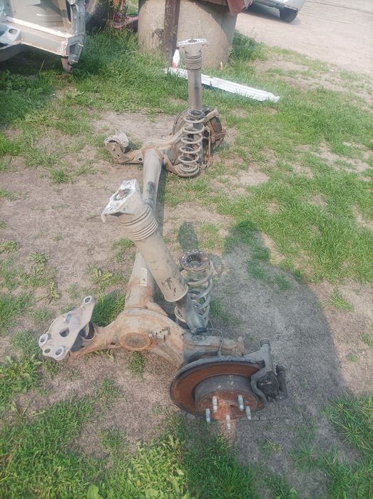 Opel Astra k tylnia oś belka sprężyny amortyzator