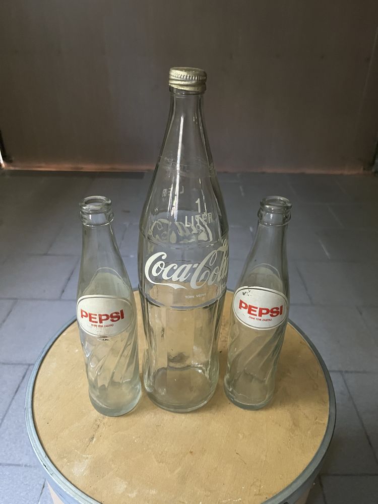 Butelki coca cola, pepsi cola