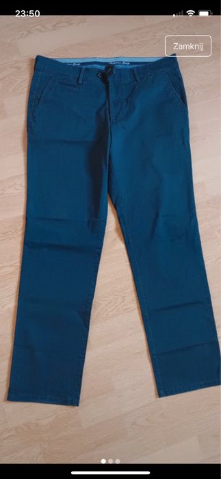 Granatowe spodnie christian berg