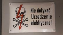 Tablica emaliowa z czasów PRL.