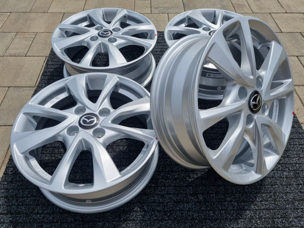 Mazda 2 felgi 15 " aluminiowe nowe 4x100 alufelgi Srebrne / Czarne