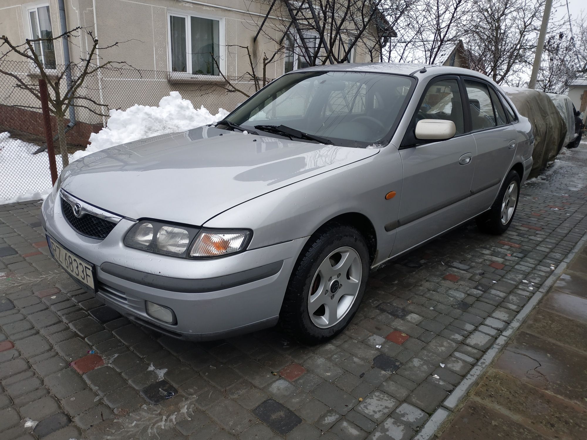 Поворот Mazda 626 GF 1997-1999