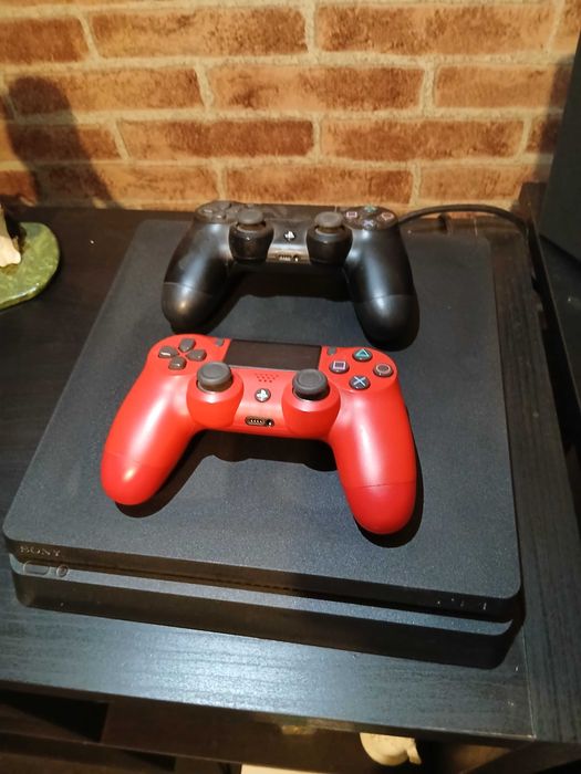 Playstation 4 + 2 comandos + jogos + volante