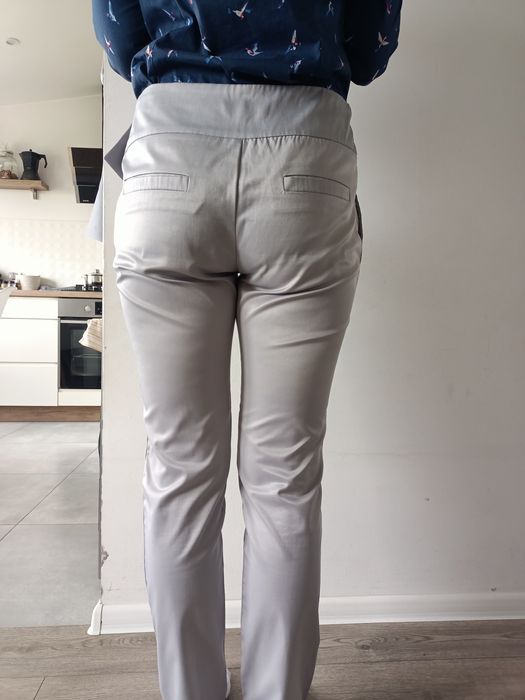 Spodnie eleganckie z kokardą rozm. L Freesia