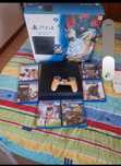 Playstation 4 (ps4) 1TB com comando e 6 jogos