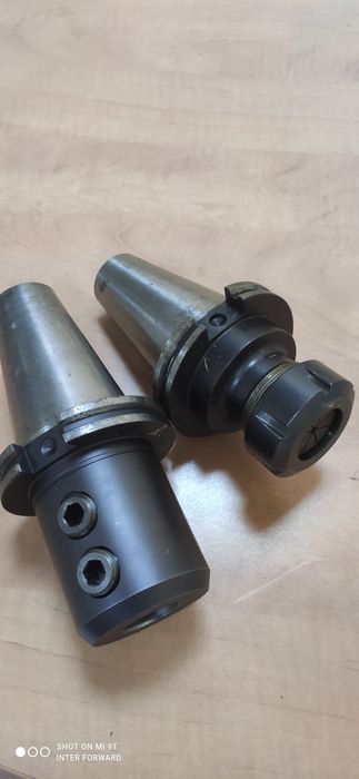 Оправках SK50 , штревельний болт DMG, Haas .