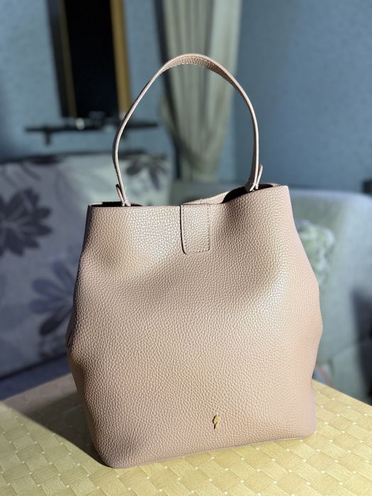 Жіноча сумка OCHNIK рожева з ремінцем