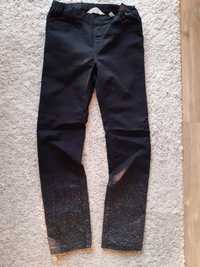 Spodnie dziewczęce czarne z brokatem 128 HM (7-8lat)