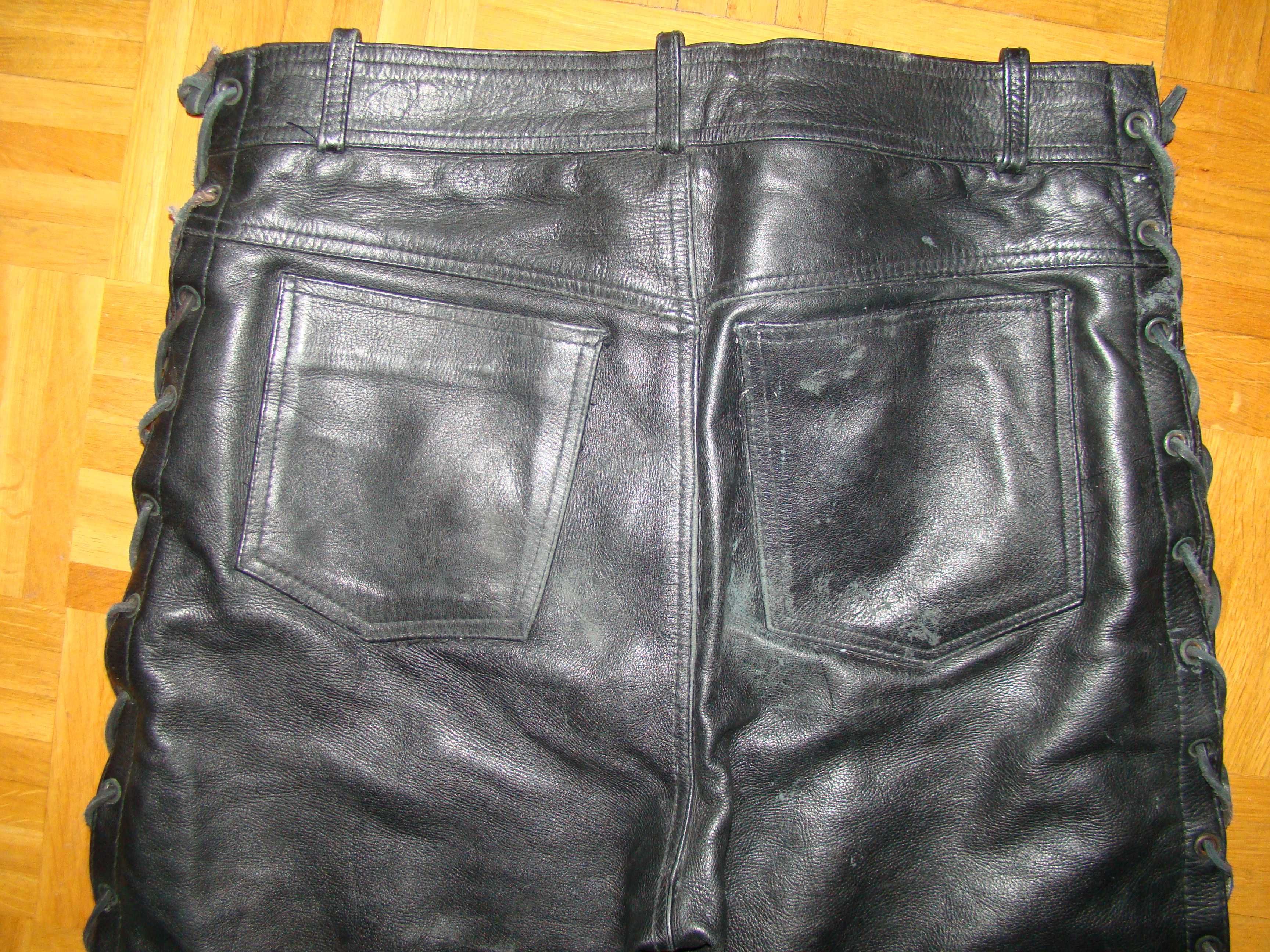 Piękne skórzane spodnie z trokami, wiązane pas 80-82 wzr do 173 cm
