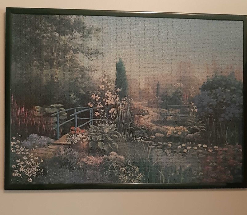 Quadro, em puzzle emoldorado. Comprimento 1 metro por 73cm de altura