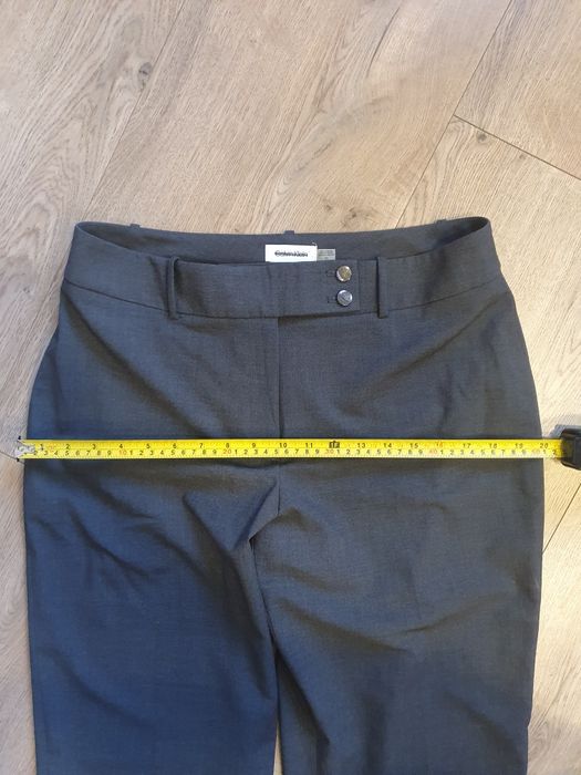 Zestaw ubrań damskich w rozmiarze L. Składy widoczne na zdjęciach.