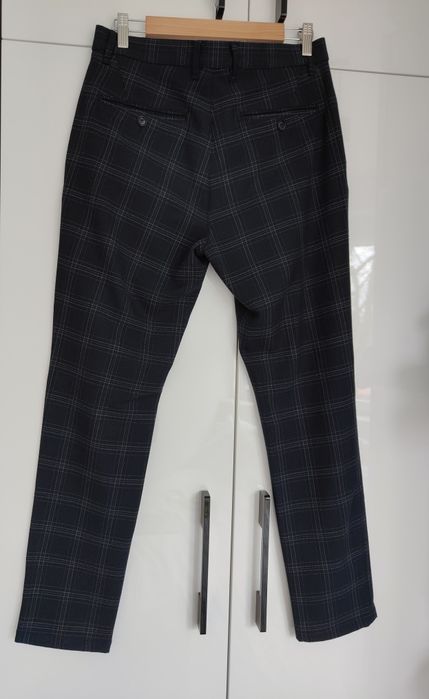 Męskie materiałowe spodnie w kratę, Zara, r. 38