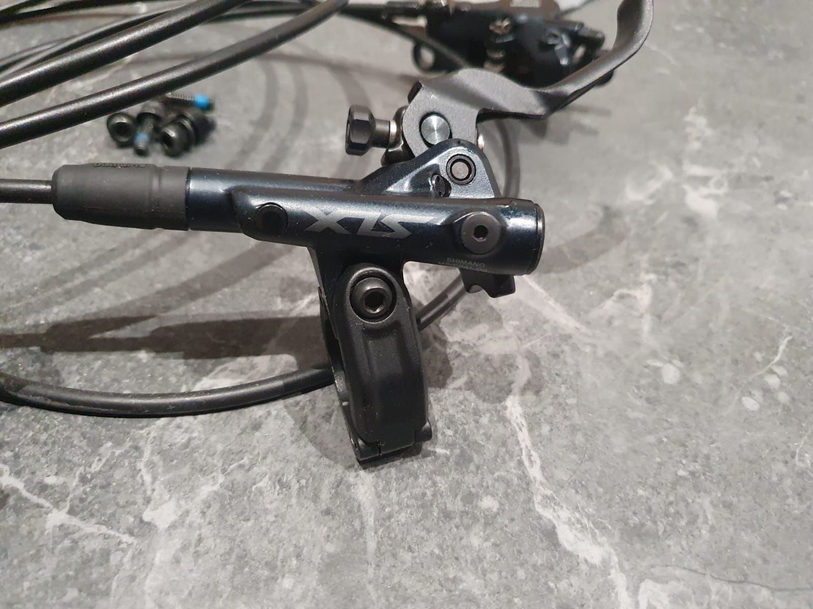 Hamulce Shimano SLX BR-M7100 kpl. + tarcze  Shimano SM-RT66-M 180 mm