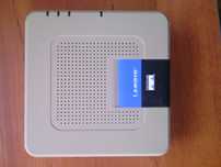 Linksys AM200- modem.