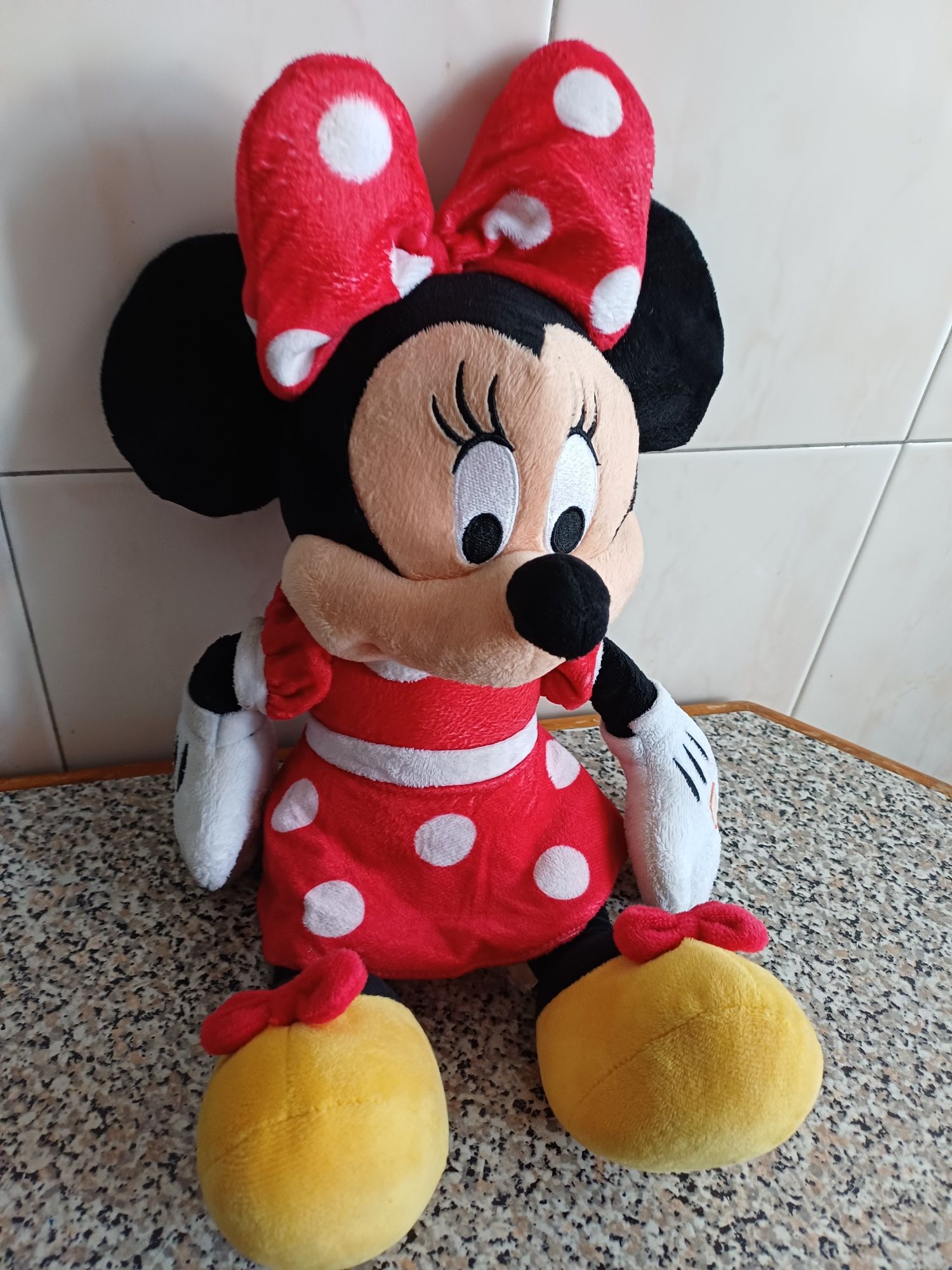 Miney como nova 7 euros. 45 cm.