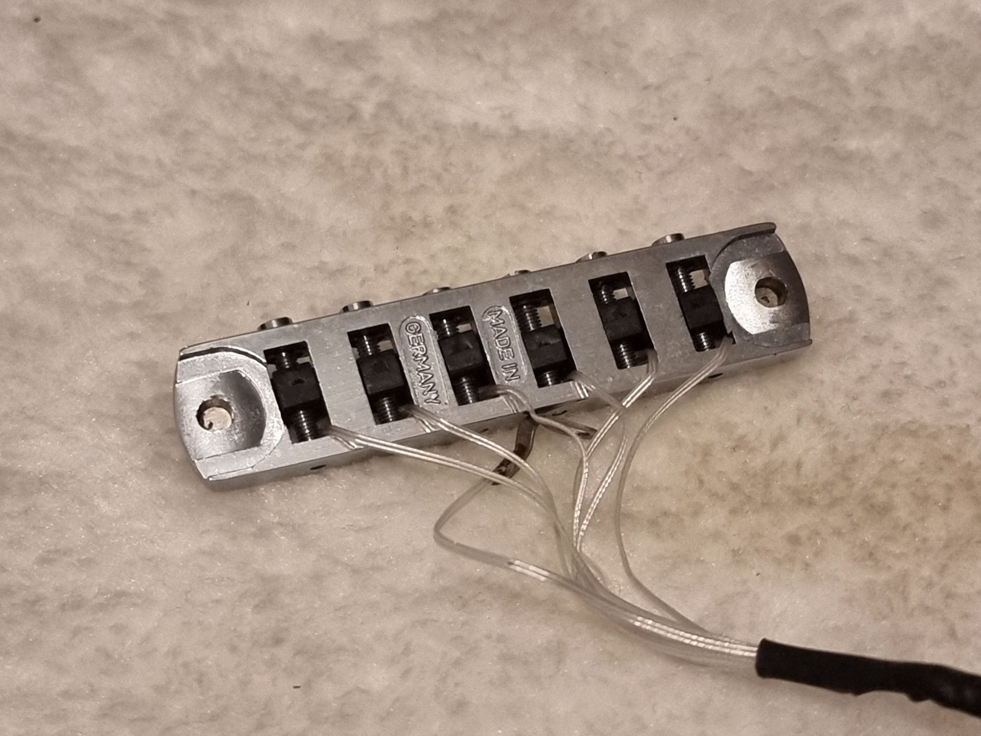 Mostek piezo Tune-O-Matic Germany Schaller