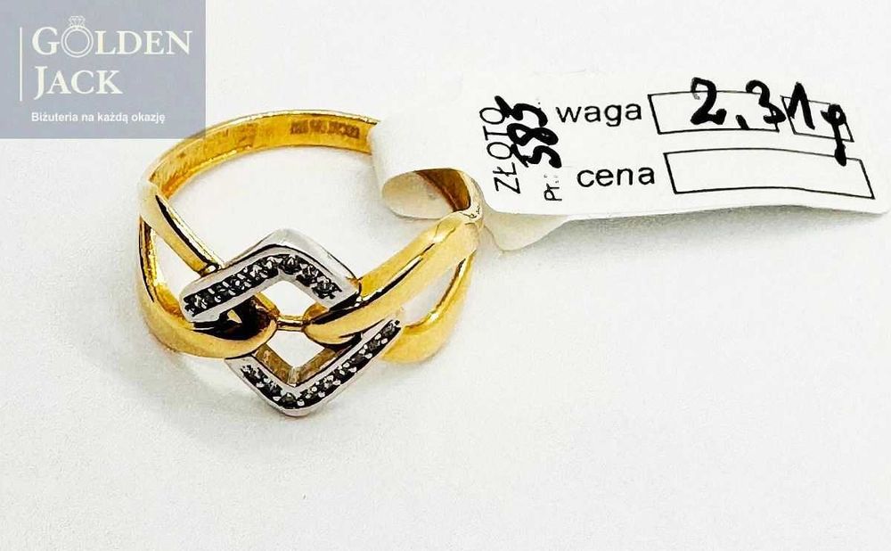 Złoty pierścionek z cyrkoniami ażurowe białe złoto p 585 roz. 16 2,31g