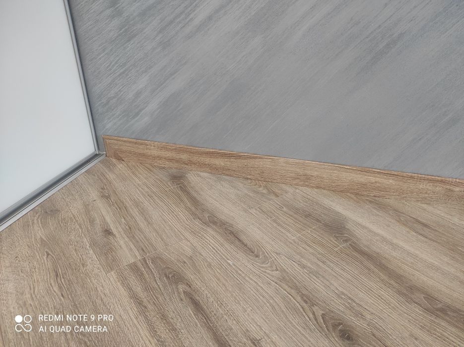 Монтаж плінтуса та ламінату Львів !  Укладка  ламінату МДФ