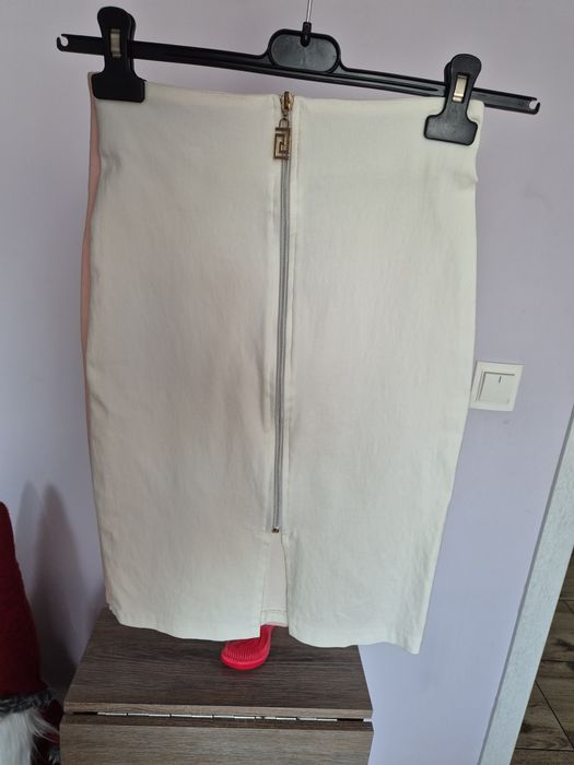 2 спідниці,в гарному стані.біла м,рожева 46р