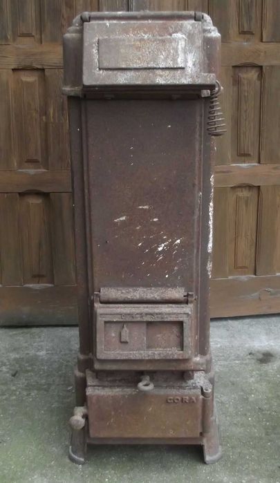 Piec typ koza używany stary żeliwny zabytkowy