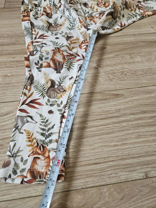 Spodnie newbie jesienne wzory lekko ocieplane liście leśne zwierzątka