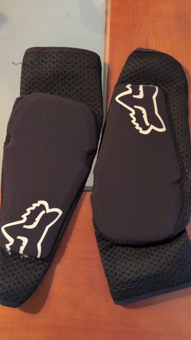 Proteção de bike, capacete, colete etc