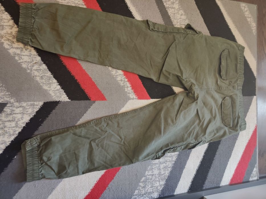 Spodnie męskie młodzieżowe zielone khaki bojówki Cropp rozmiar 34L