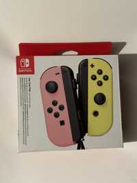 Joy Con pastel pink yellow Nintendo Switch